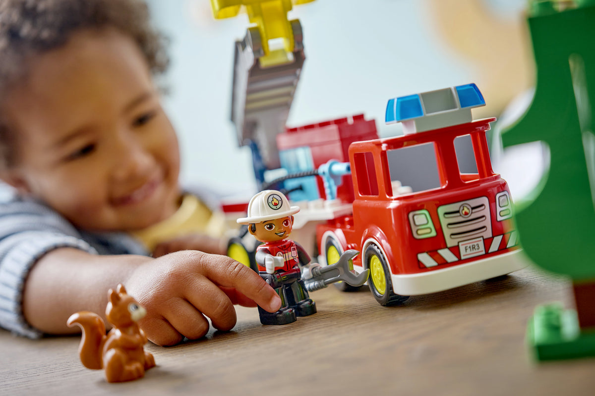 Fire Truck with Hose and Firefighter