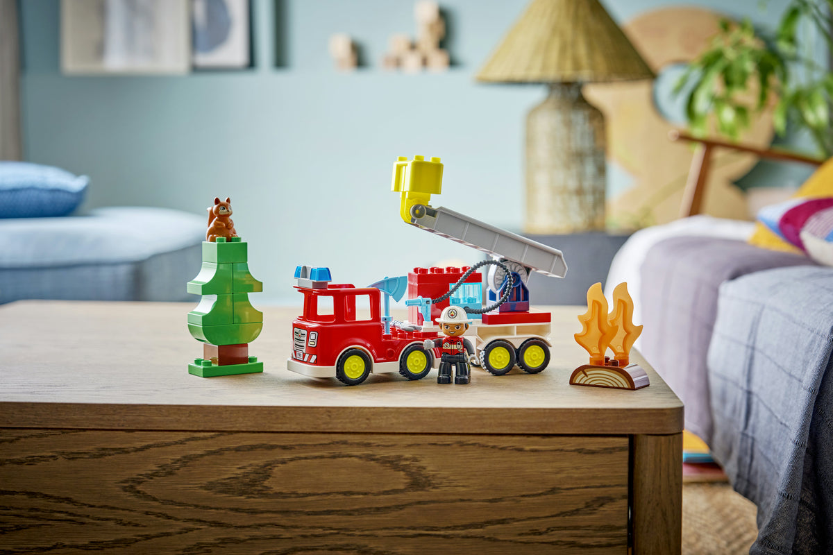 Fire Truck with Hose and Firefighter