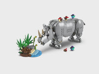 Wild Animals: Majestic Rhino with Birds